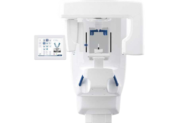 White panoramic dental x ray machine designed for patient to sit in, includes screen featuring dental radiograph